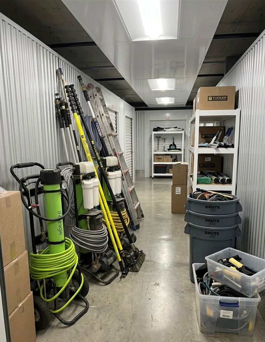 Core Exteriors equipment storage facility — Tucker systems, pressure wash rigs, and professional-grade tools