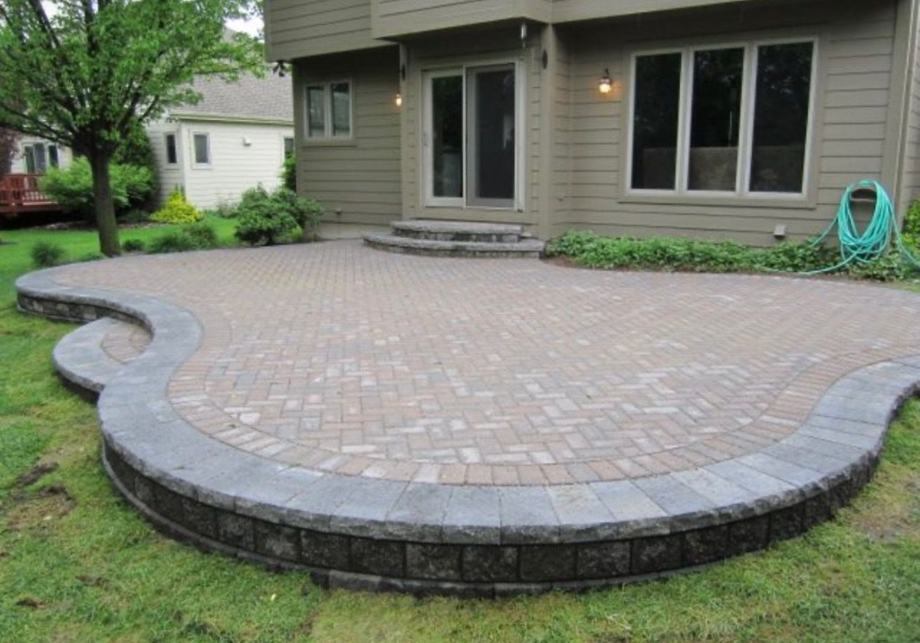 Level and clean interlock patio in London Ontario after professional relevelling service by Core Exteriors
